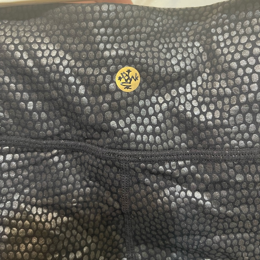 Manduka skin tight black yoga pants, woman’s medium, black with dots.